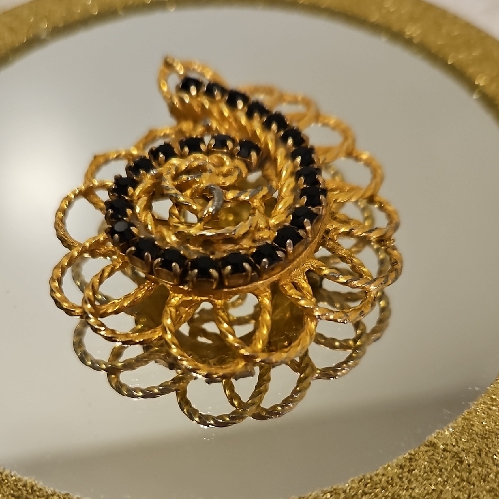 Elegant Gold and Black Vintage Spiral Brooch